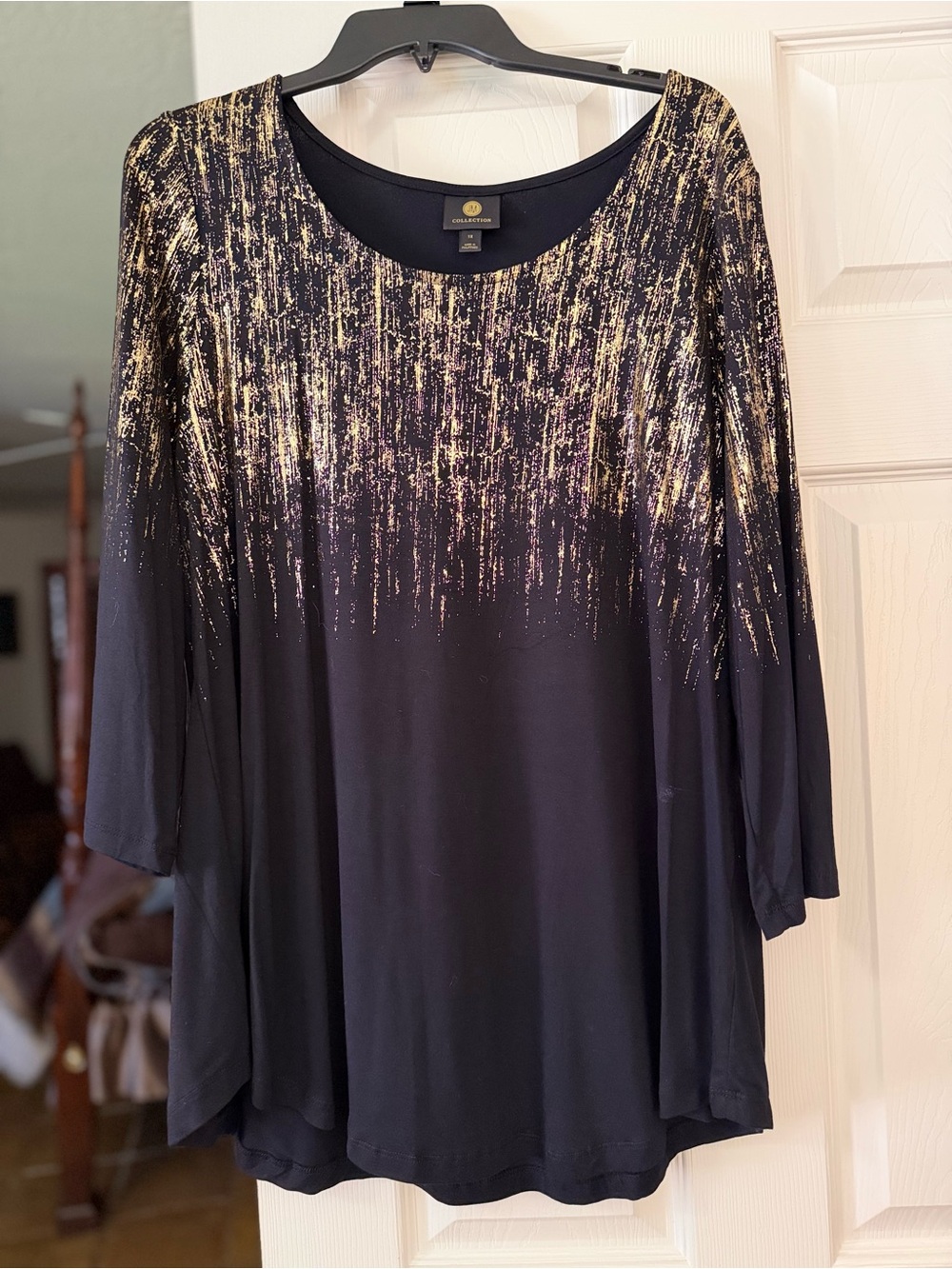 Charming Black Top with Gold Sparkle Detail